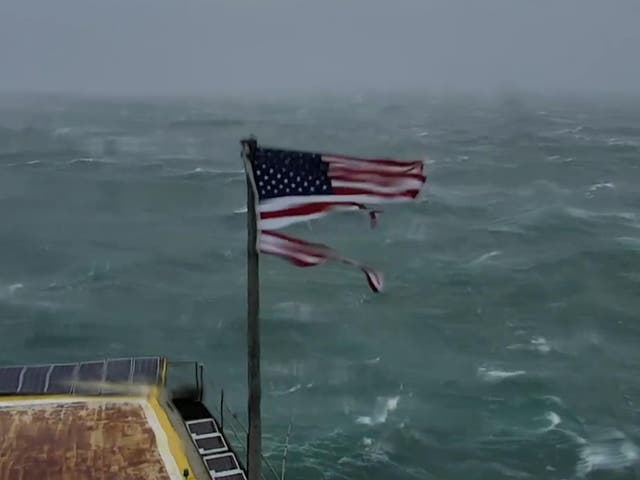 American flag ripped apart by Hurricane Florence winds