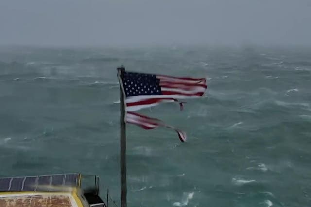 American flag ripped apart by Hurricane Florence winds