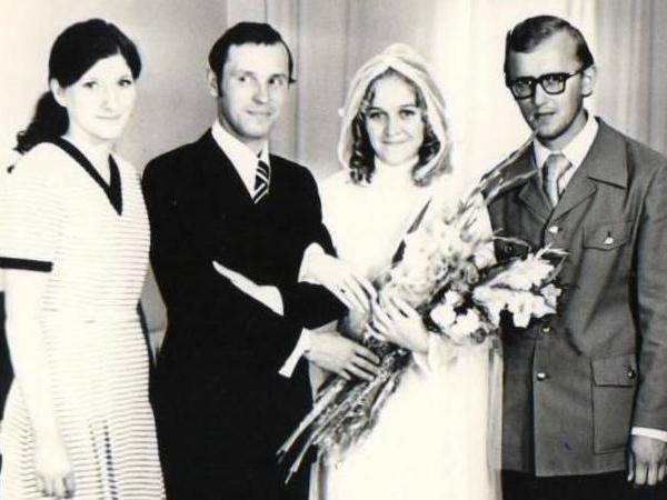 Stepan Polyakov and his wife Anna (both centre) on their wedding day in 1975