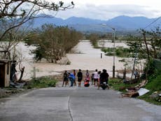 Twelve dead as Typhoon Mangkhut tears through Philippines