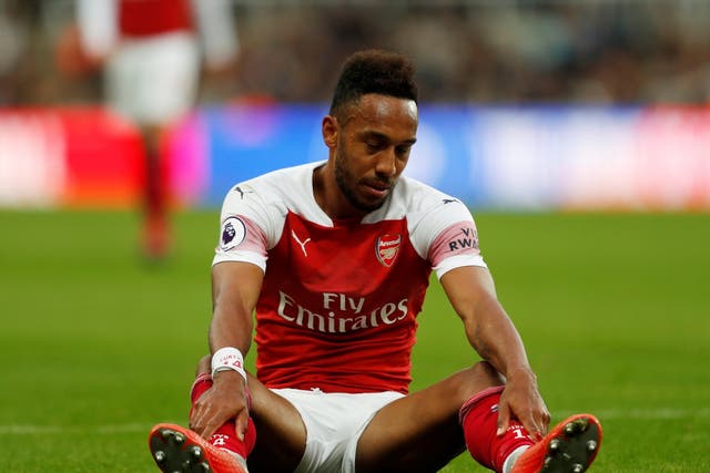 Pierre-Emerick Aubaeyang appears dejected after missing a chance for Arsenal against Newcastle