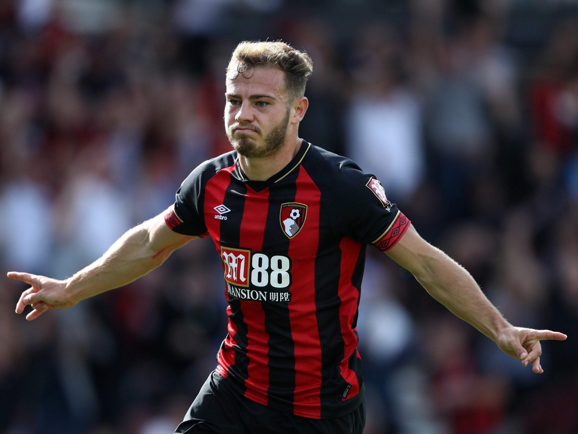 Ryan Fraser celebrates after scoring his second goal for Bournemouth against Leicester