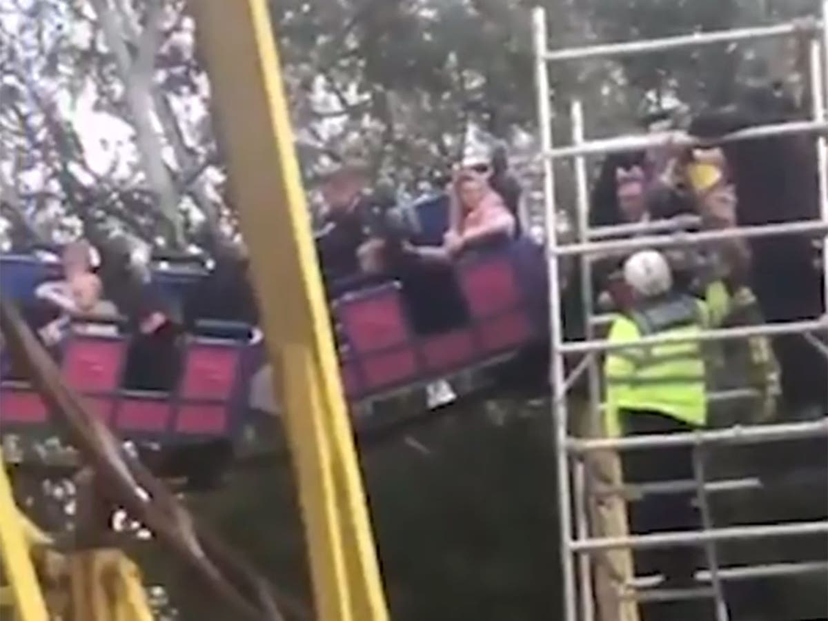 Children trapped 50ft in air on rollercoaster after 'wheel falls off'