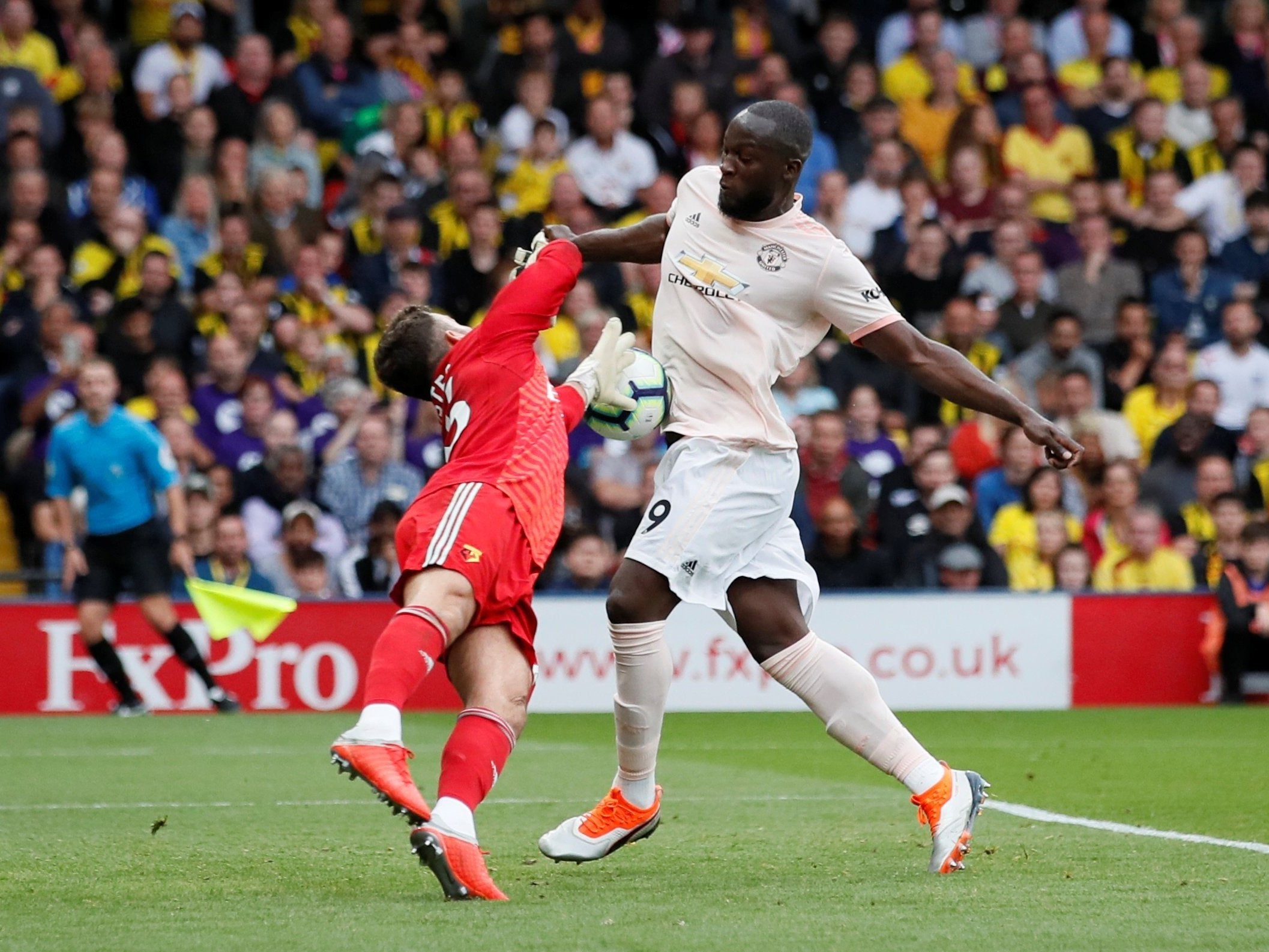 Romelu Lukaku scores by diverting the ball beyond Ben Foster