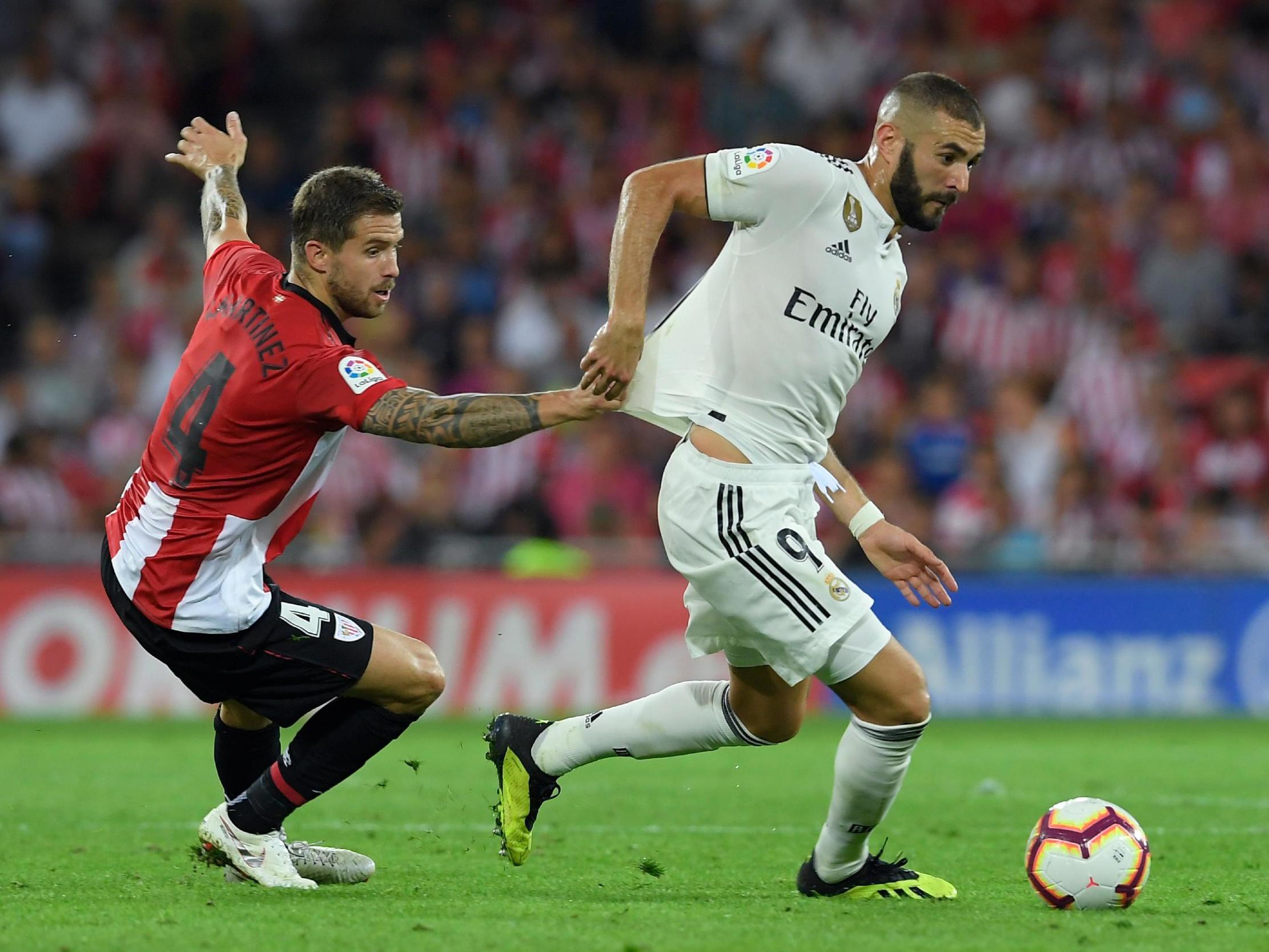 Karim Benzema spins clear of Inigo Martinez