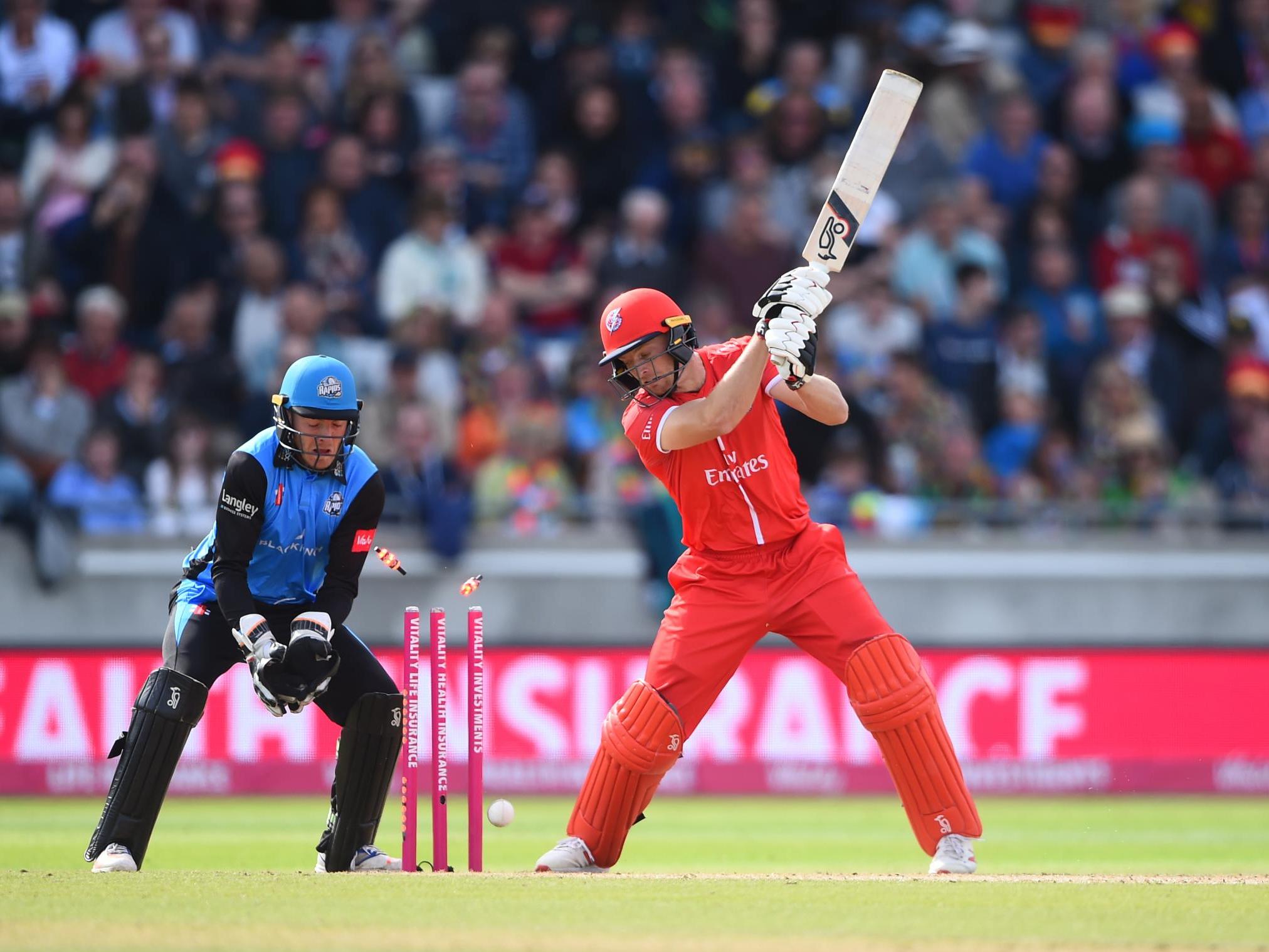 Jos Buttler of Lancashire is bowled by Moeen Ali