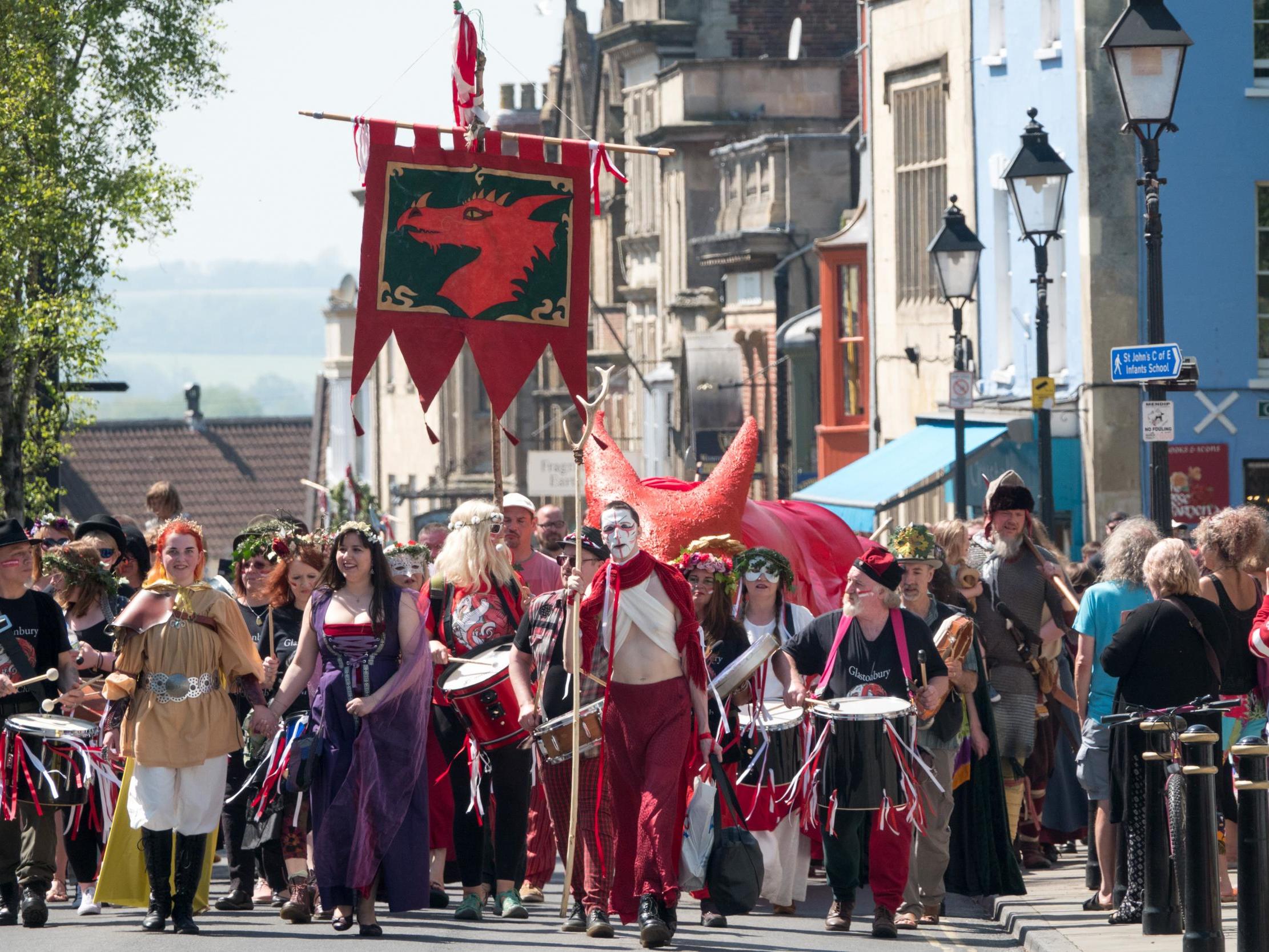 Glastonbury is a hub of new-age events such as this dragon procession in May