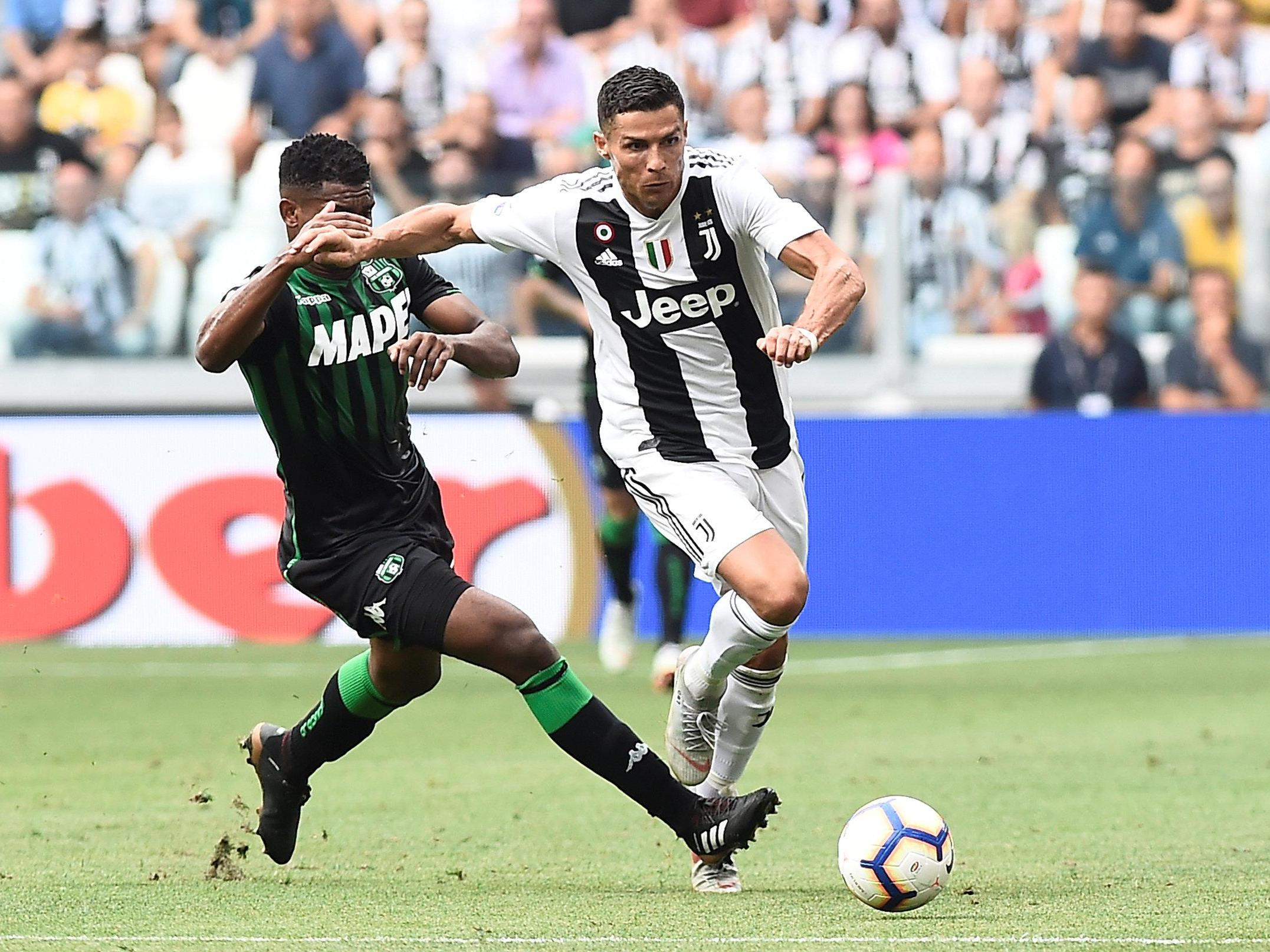 Cristiano Ronaldo does NOT look happy as Juventus star wears