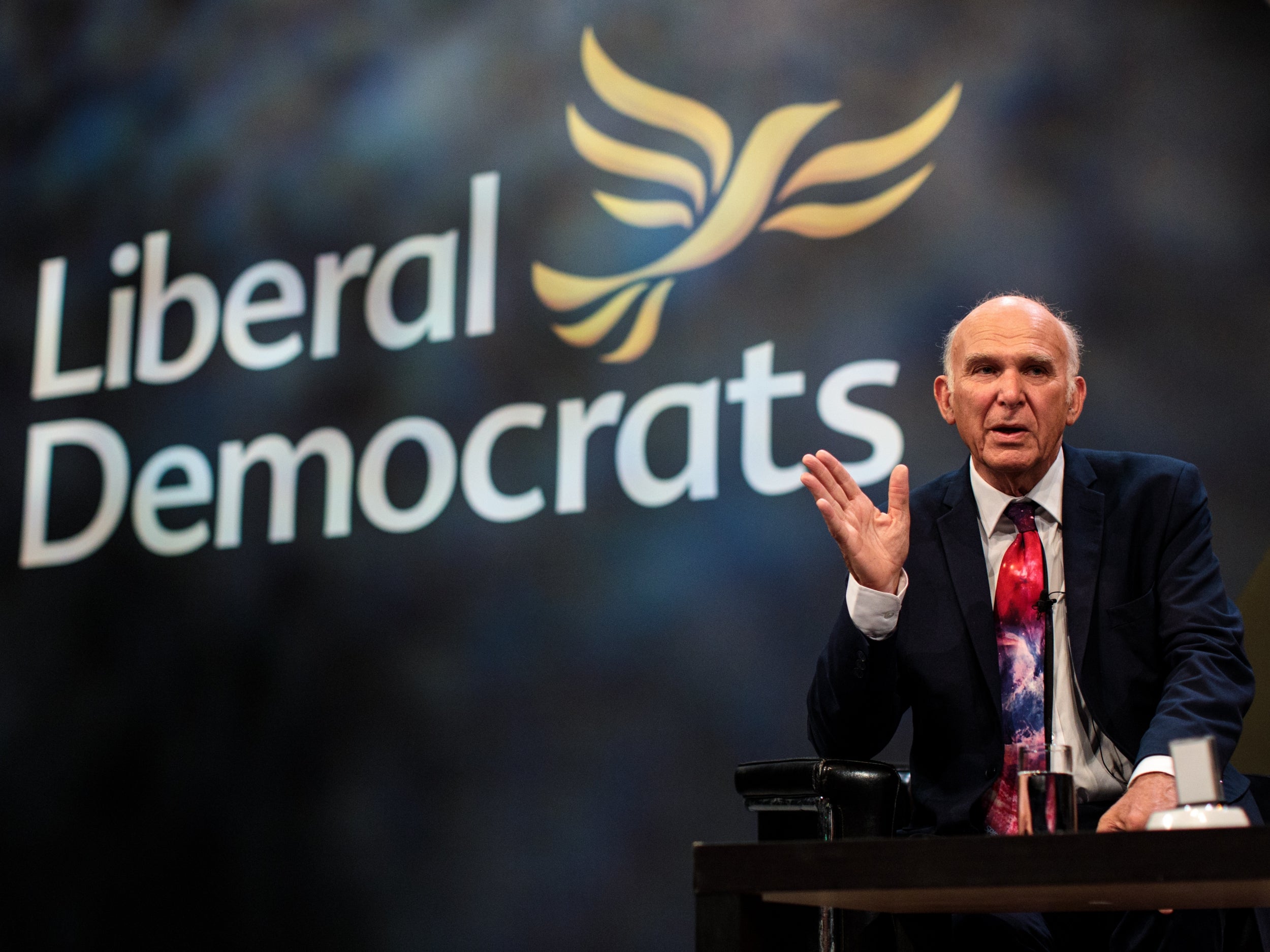 Sir Vince Cable addresses the Lib Dem conference in Brighton