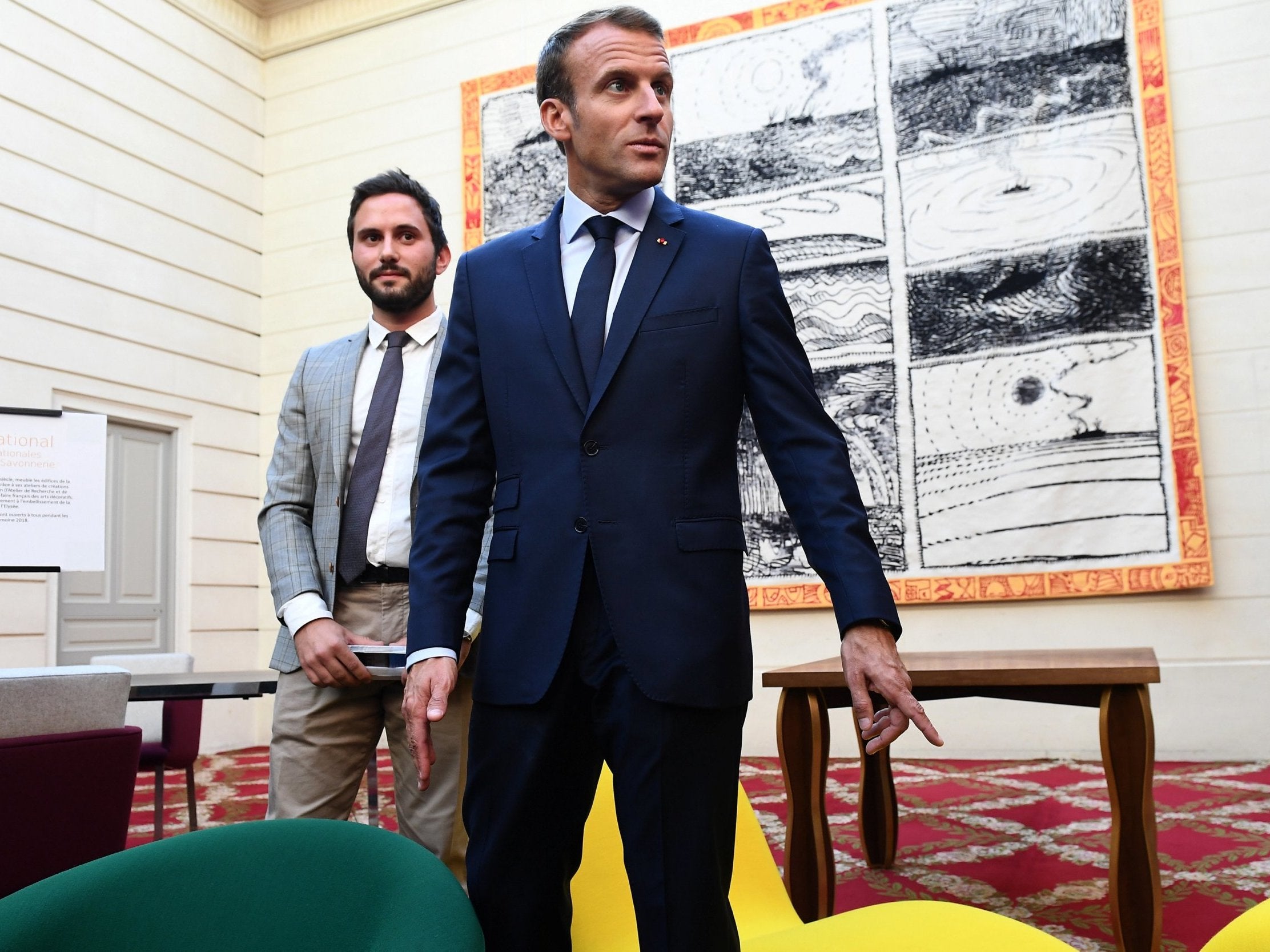 Emmanuel Macron met members of the public at the Elysee Palace