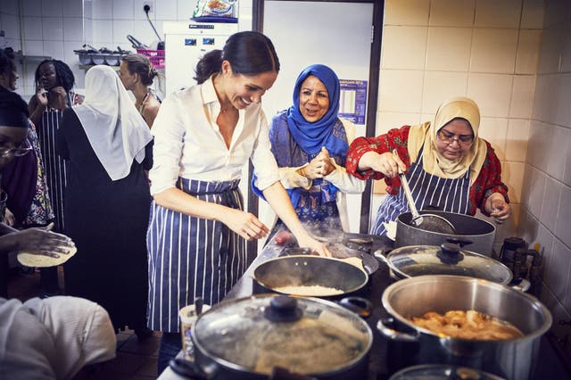 The Duchess of Sussex cooks with women in the Hubb Community Kitchen at the Al Manaar Muslim Cultural Heritage Centre in west London