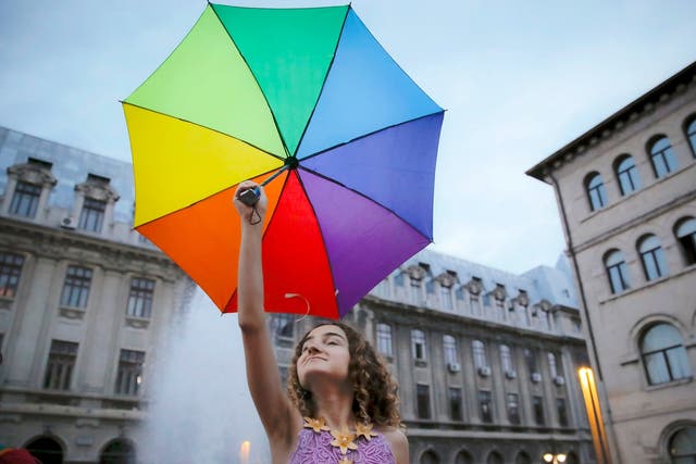 Activists in Bucharest are protesting against proposed changes to the constitution that would remove references to a 'union between spouses' and redefine marriage as a 'union between a man and a woman'