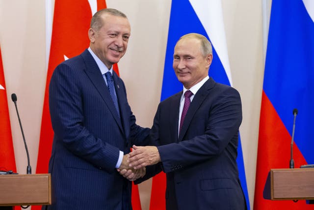 Russian President Vladimir Putin, right, and Turkish President Recep Tayyip Erdogan after talks in Sochi