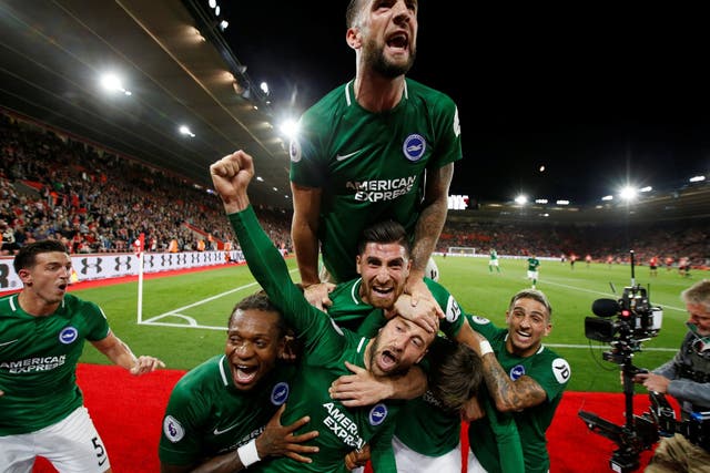 Brighton celebrate Glenn Murray’s late penalty