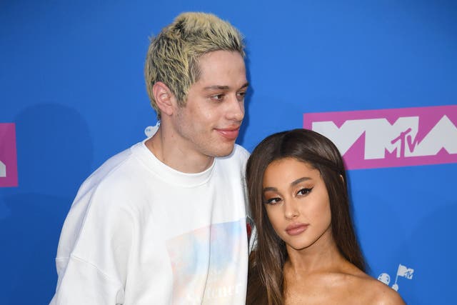 Ariana Grande, pictured right, with her fiancé Pete Davidson