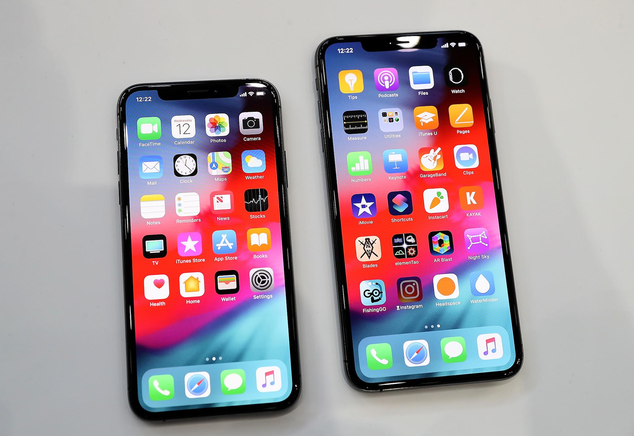 The new Apple iPhone Xs (L) and iPhone Xs Max (R) are displayed during an Apple special event at the Steve Jobs Theatre on September 12, 2018 in Cupertino, California