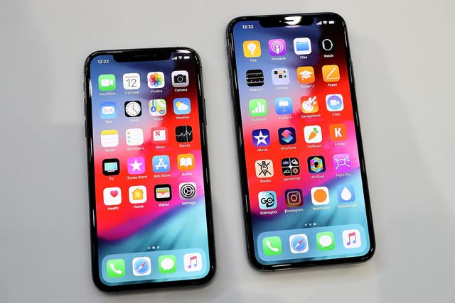 The new Apple iPhone Xs (L) and iPhone Xs Max (R) are displayed during an Apple special event at the Steve Jobs Theatre on September 12, 2018 in Cupertino, California