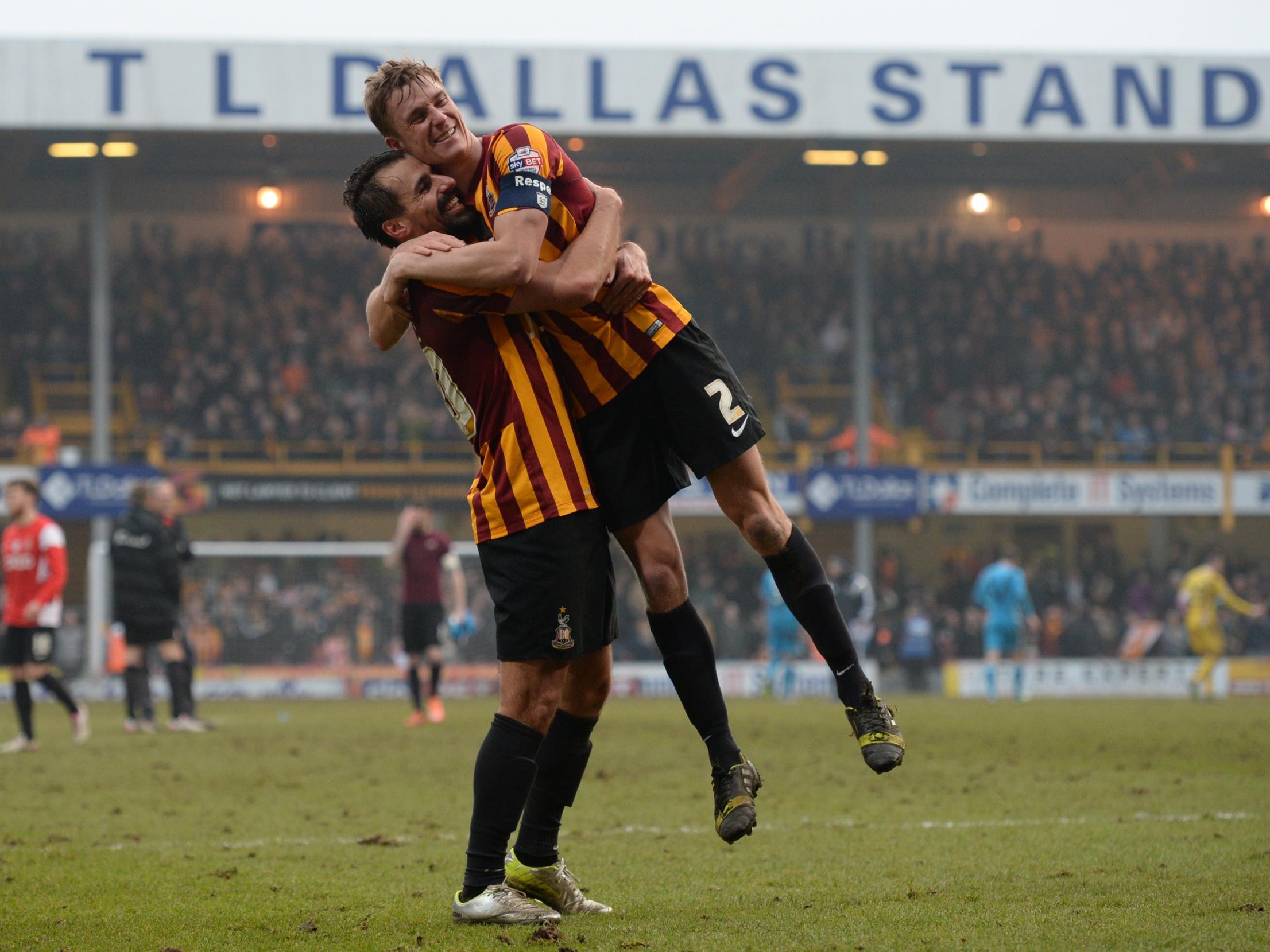 Stephen Darby celebrates with Filipe Morais after beating Sunderland in the FA Cup fifth round in 2015