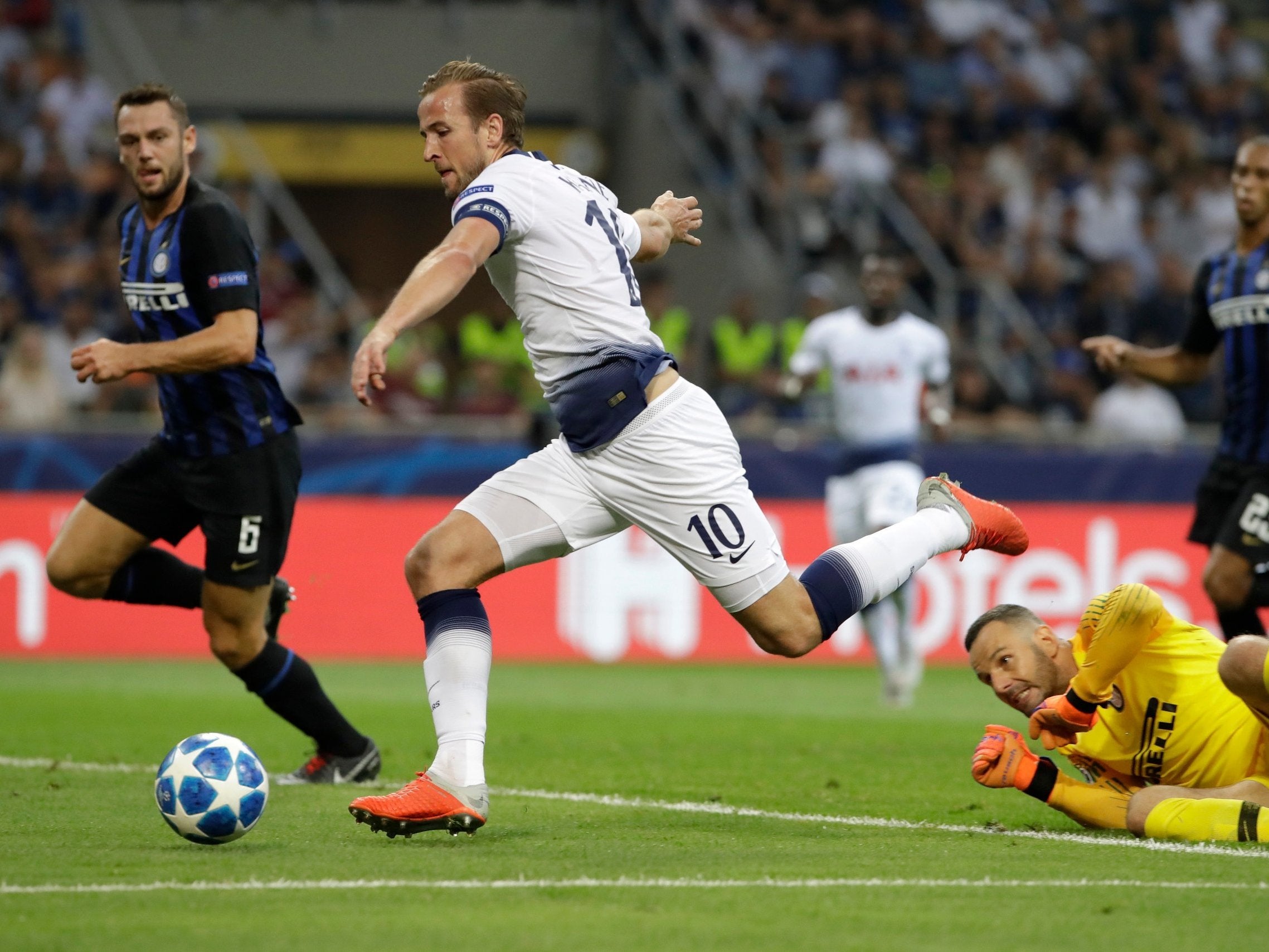 Harry Kane rounds the goalkeeper but cannot finish