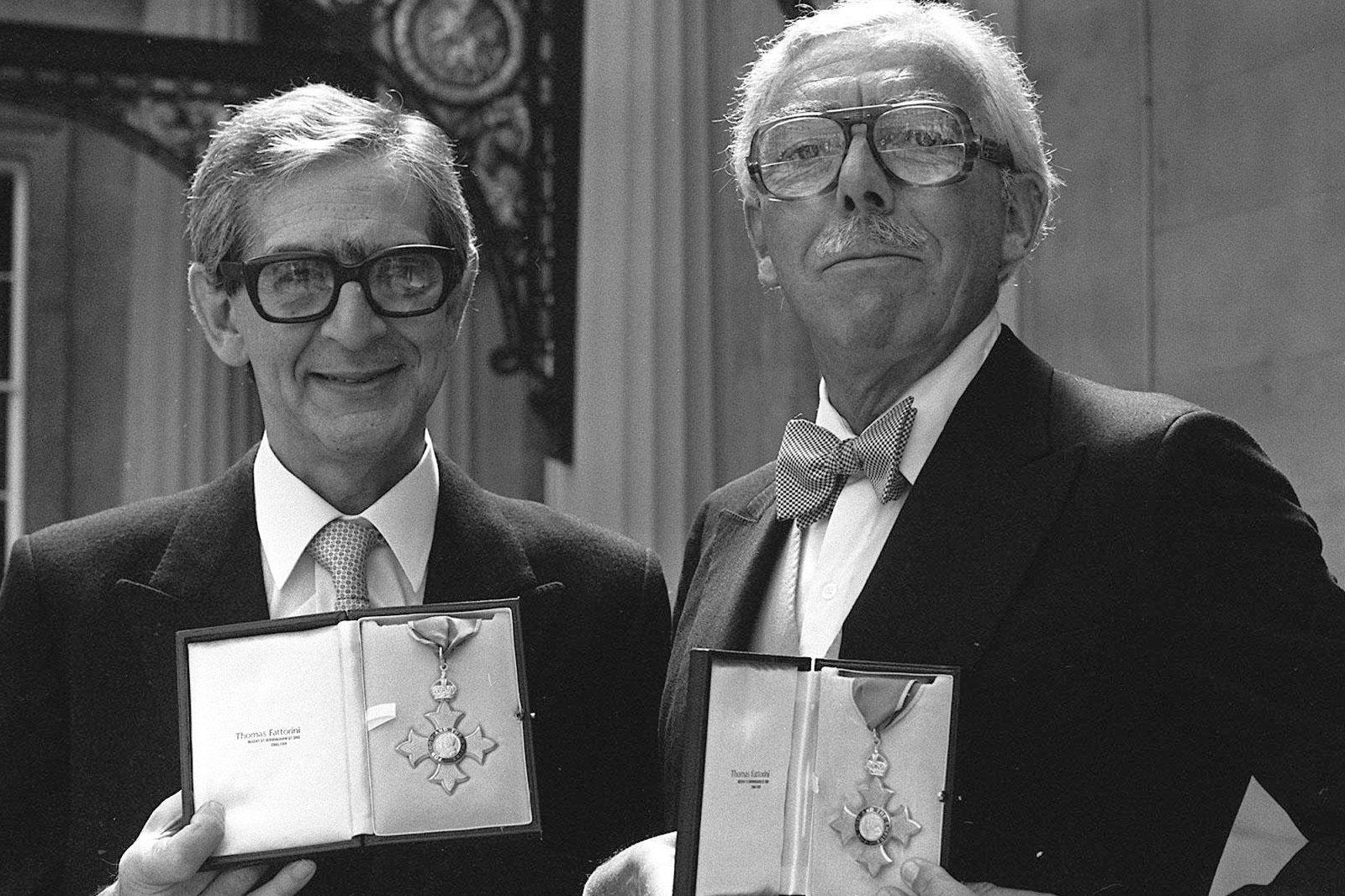 &#13;
Denis Norden and Frank Muir with their CBEs at Buckingham Palace &#13;