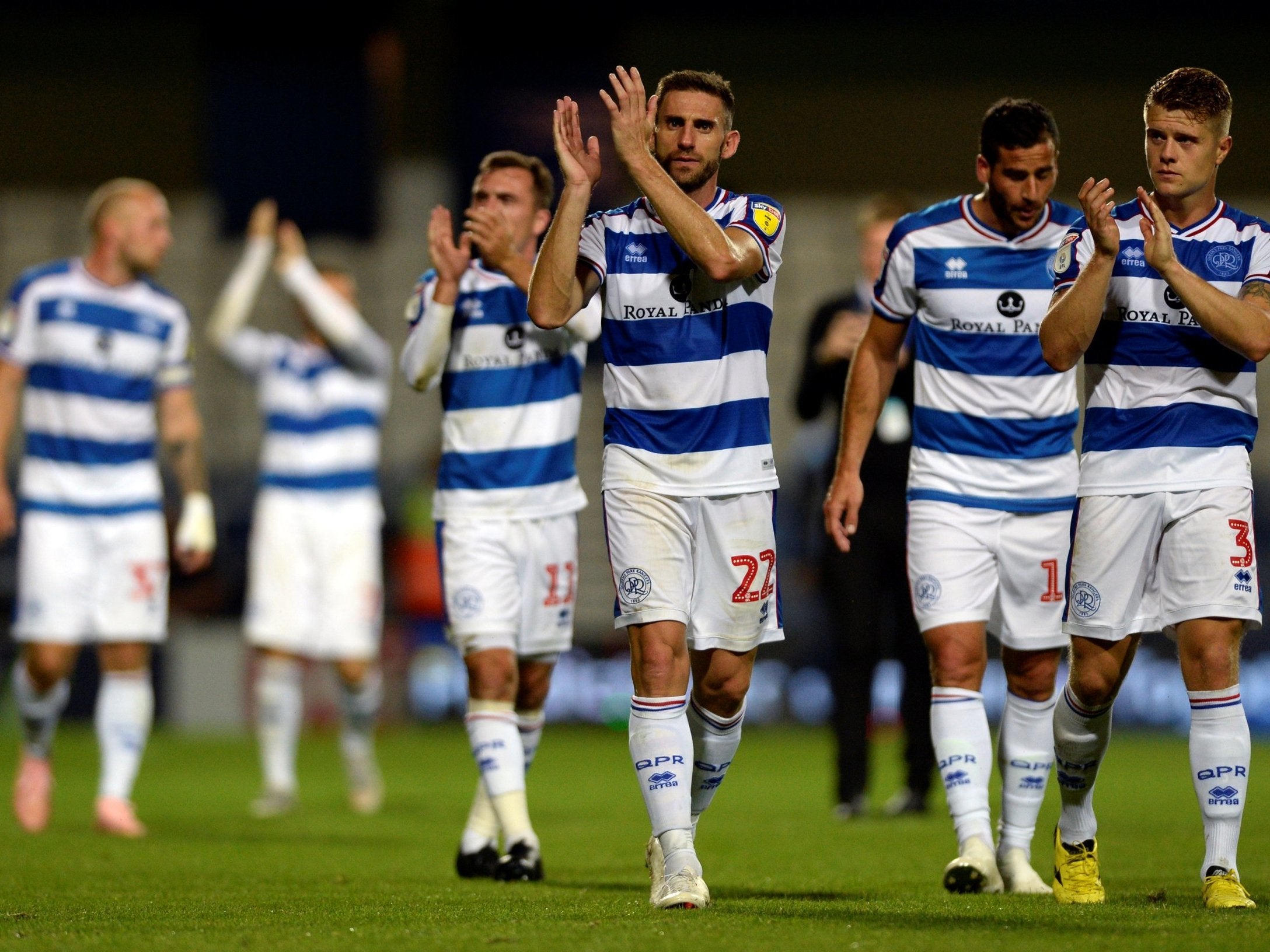 QPR's players celebrate their victory over Millwall