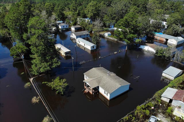 The van, carrying two women being transported to a mental health facility, was overtaken by flood waters as a result of Hurricane Florence