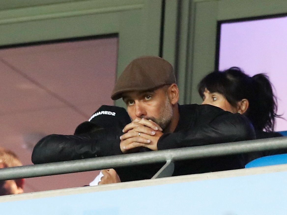 The suspended Pep Guardiola was forced to watch City’s defeat by Lyon from the stands