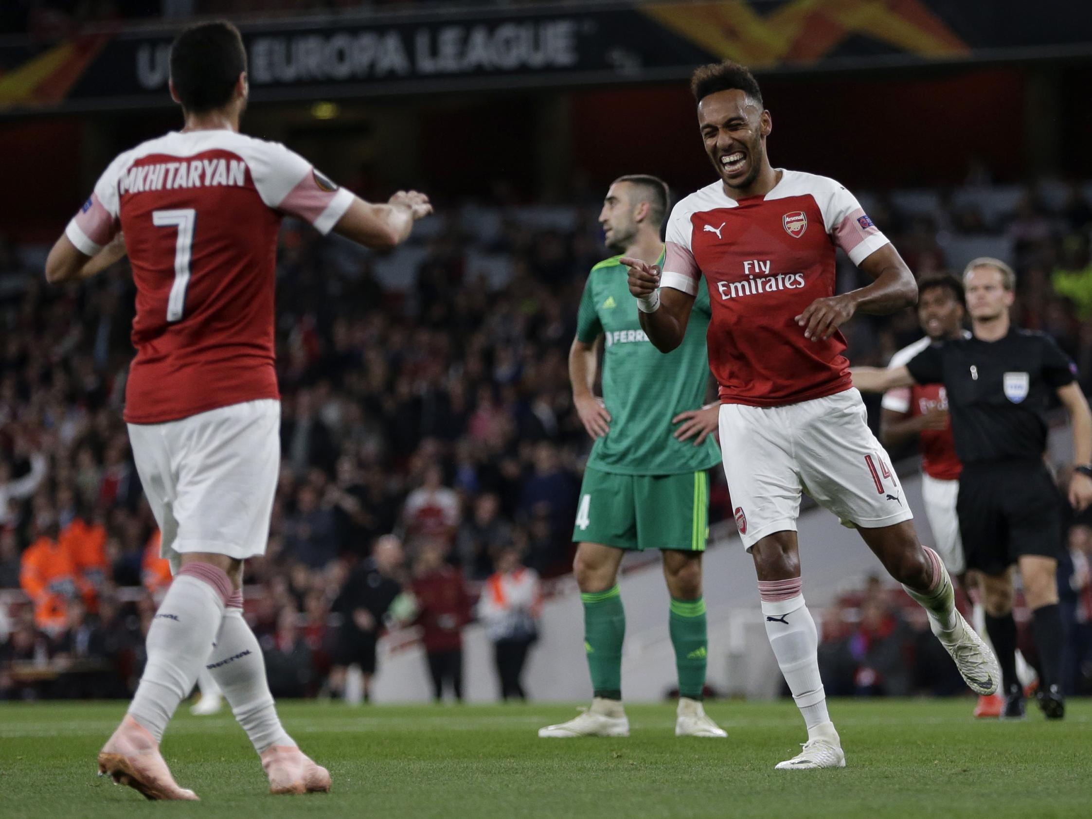 Pierre-Emerick Aubameyang struck twice to help Arsenal on their way