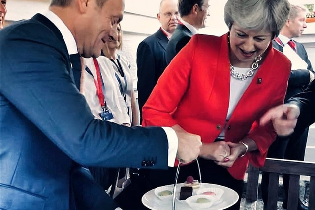 The European Council president offered Theresa May some cake