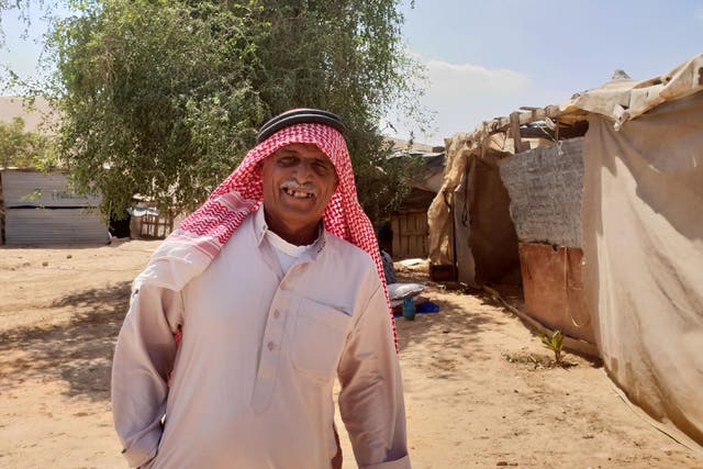 Sixty-year-old Palestinian Abu Yussef Abu Dahuk in front of the shack where he lives in the West Bank