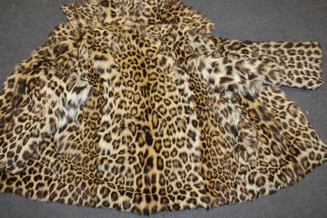 A leopard fur coat offered for sale by Timothy Norris over eBay