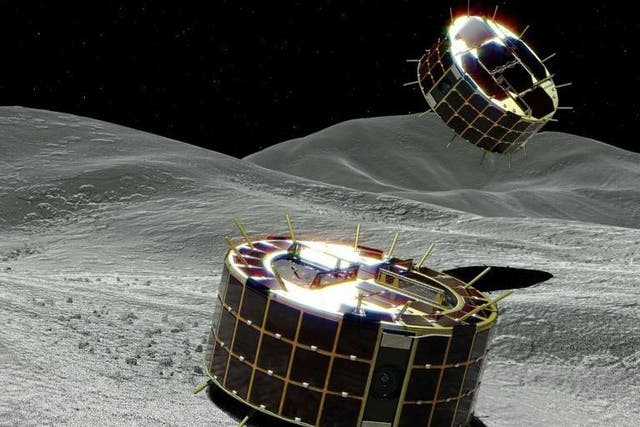 Artists impression of the Minerva-II-1 rovers landing on the surface of the Ryugu asteroid