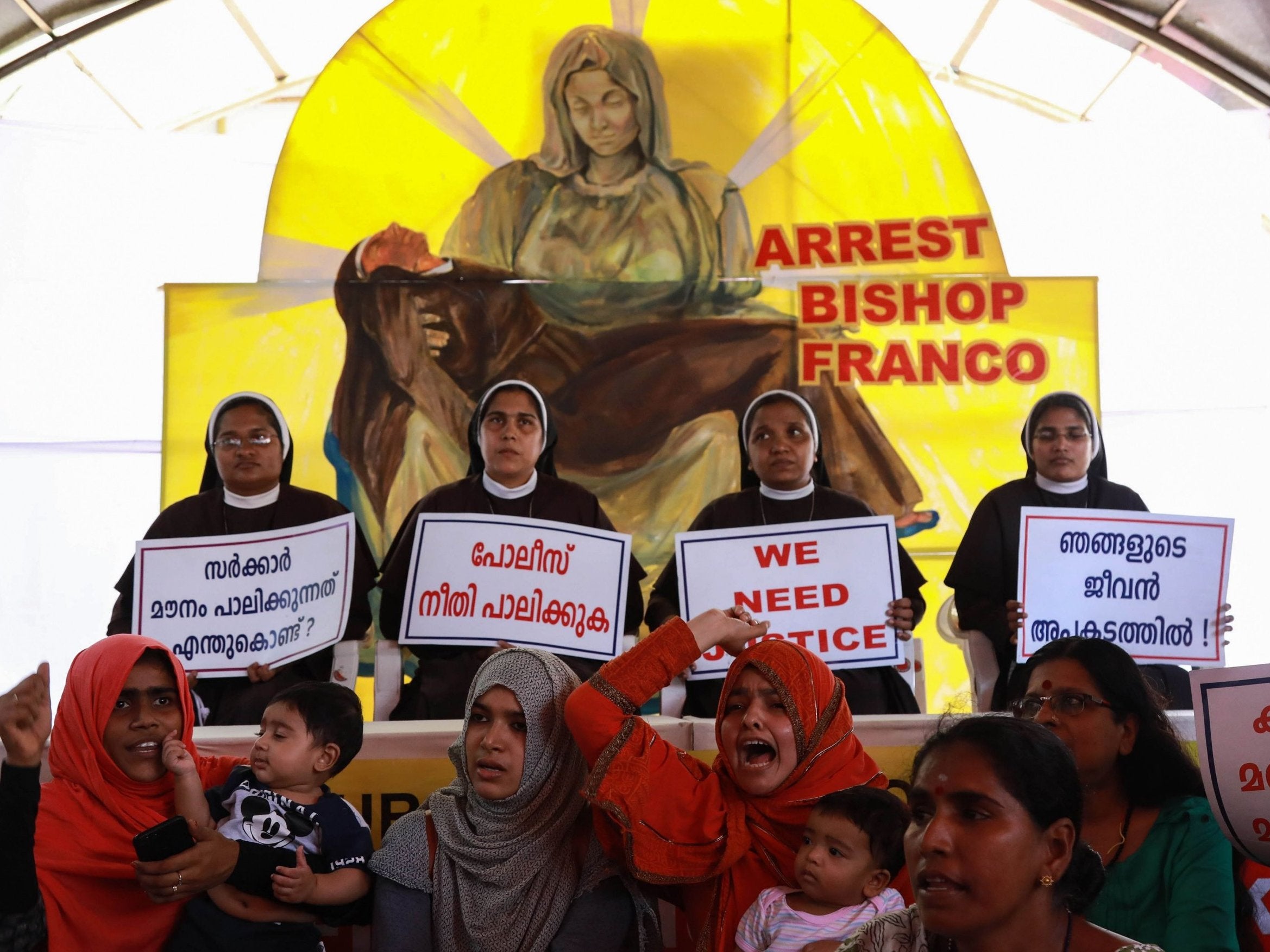 Indian nuns and supporters demand the bishop's arrest during protests this month (AFP/Getty)