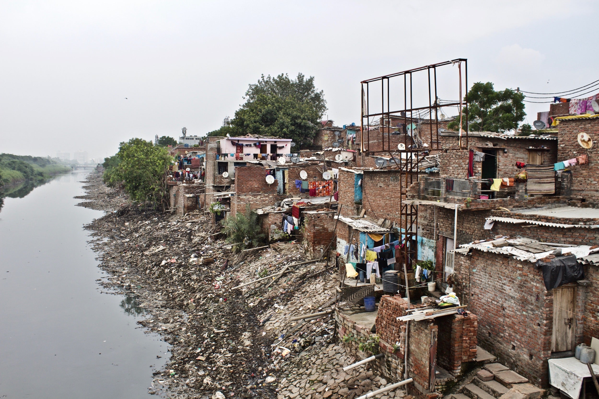Modicare will cater to the poorest 40 per cent of Indians – eventually including those living in slums like this one, on the outskirts of Delhi. Here, there was little awareness of the incoming scheme