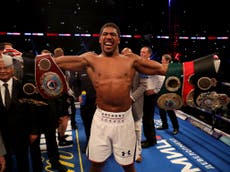 Joshua defends world titles with seventh round stoppage of Povetkin