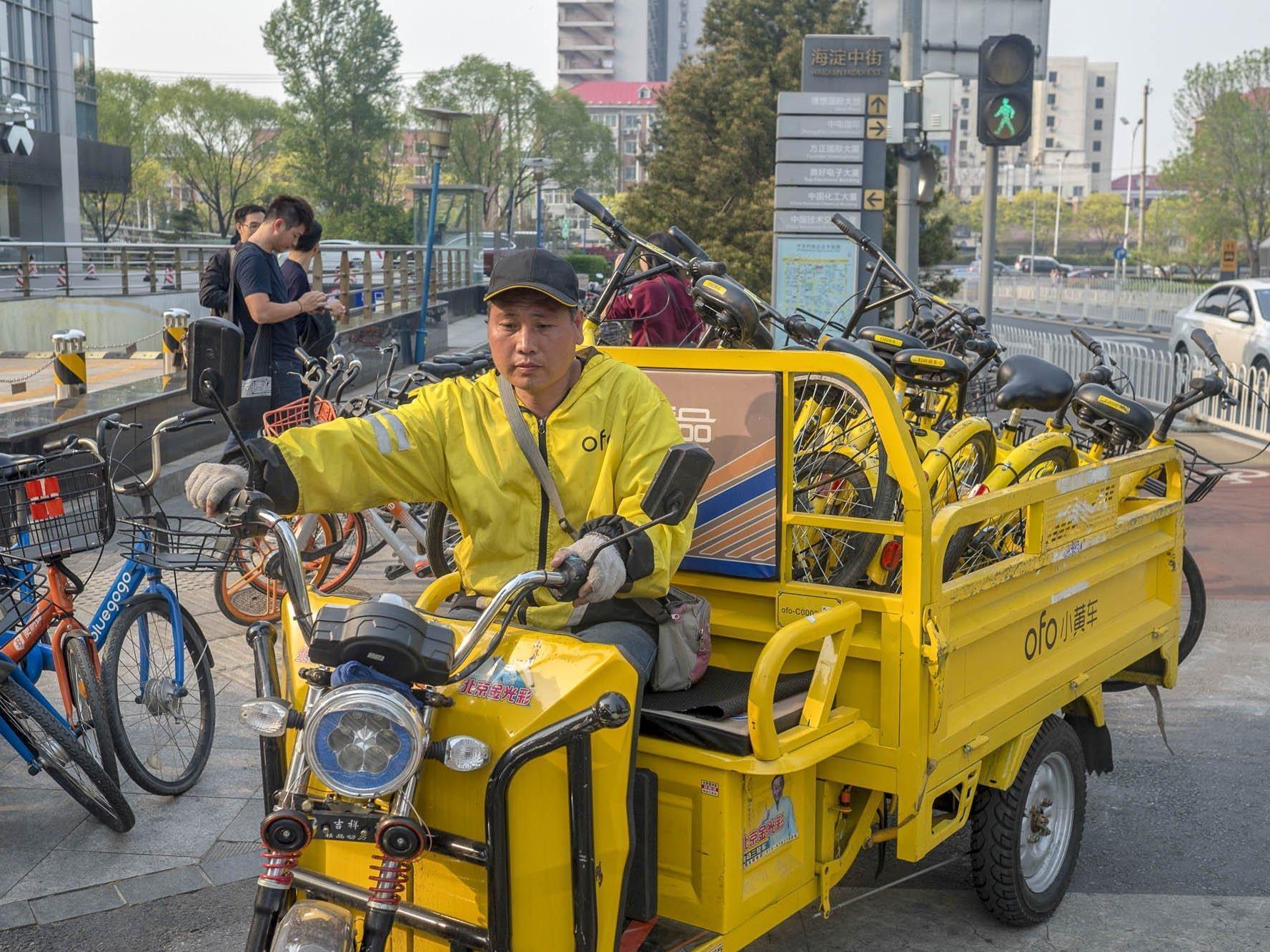 In Chinese cities, there are tens of thousands of workers fulfilling city dwellers' every wish, on demand. Harrison Jacobs/Business Insider