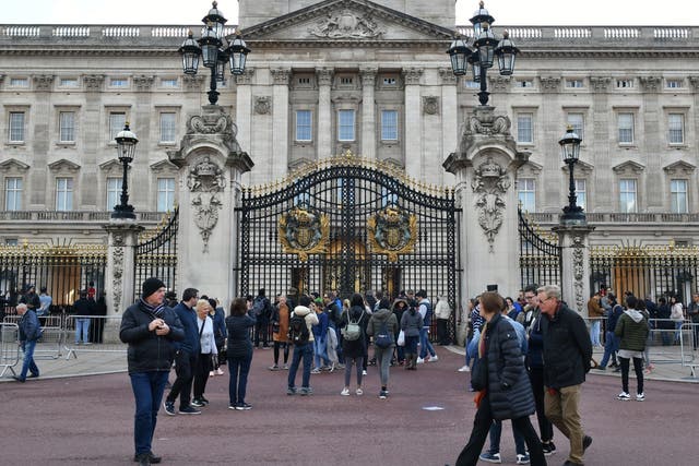 Tourists outside Buckingham Palace in London