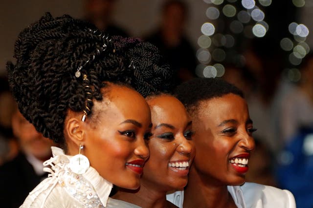 Director Wanuri Kahiu of 'Rafiki' poses with the film's stars Sheila Munyiva and Samantha Mugatsia