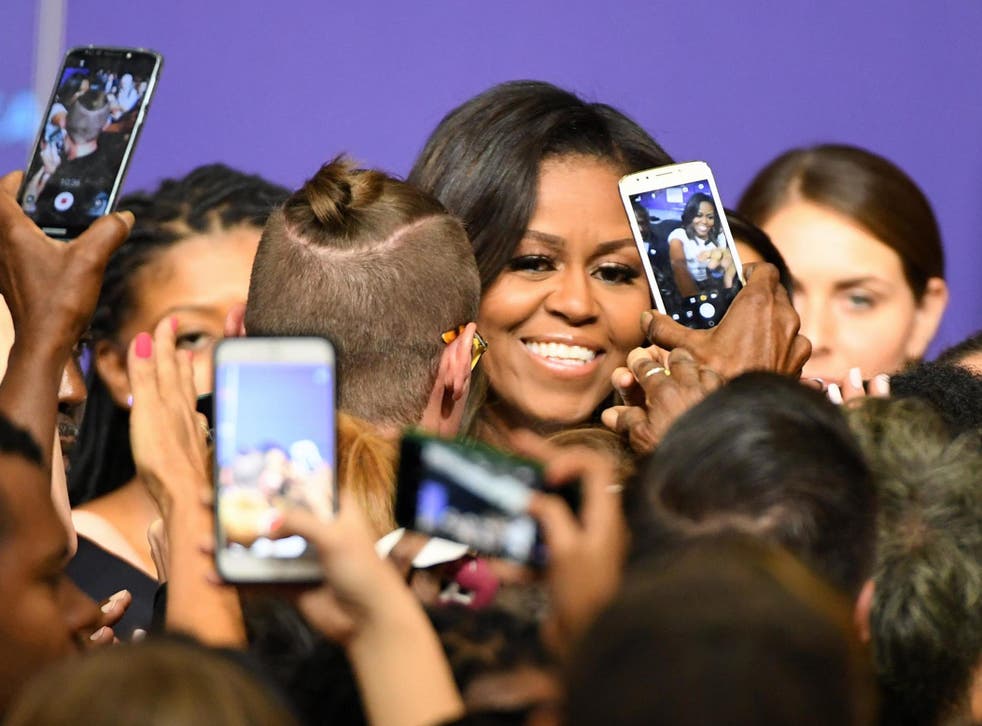Former first lady Michelle Obama greets supporters after speaking at a rally for When We All Vote's National Week of Action at Chaparral High School on September 23, 2018 in Las Vegas, Nevada.