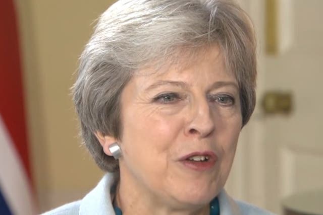 Theresa May appeared to hesitate when asked about whether she trusted the US leader.