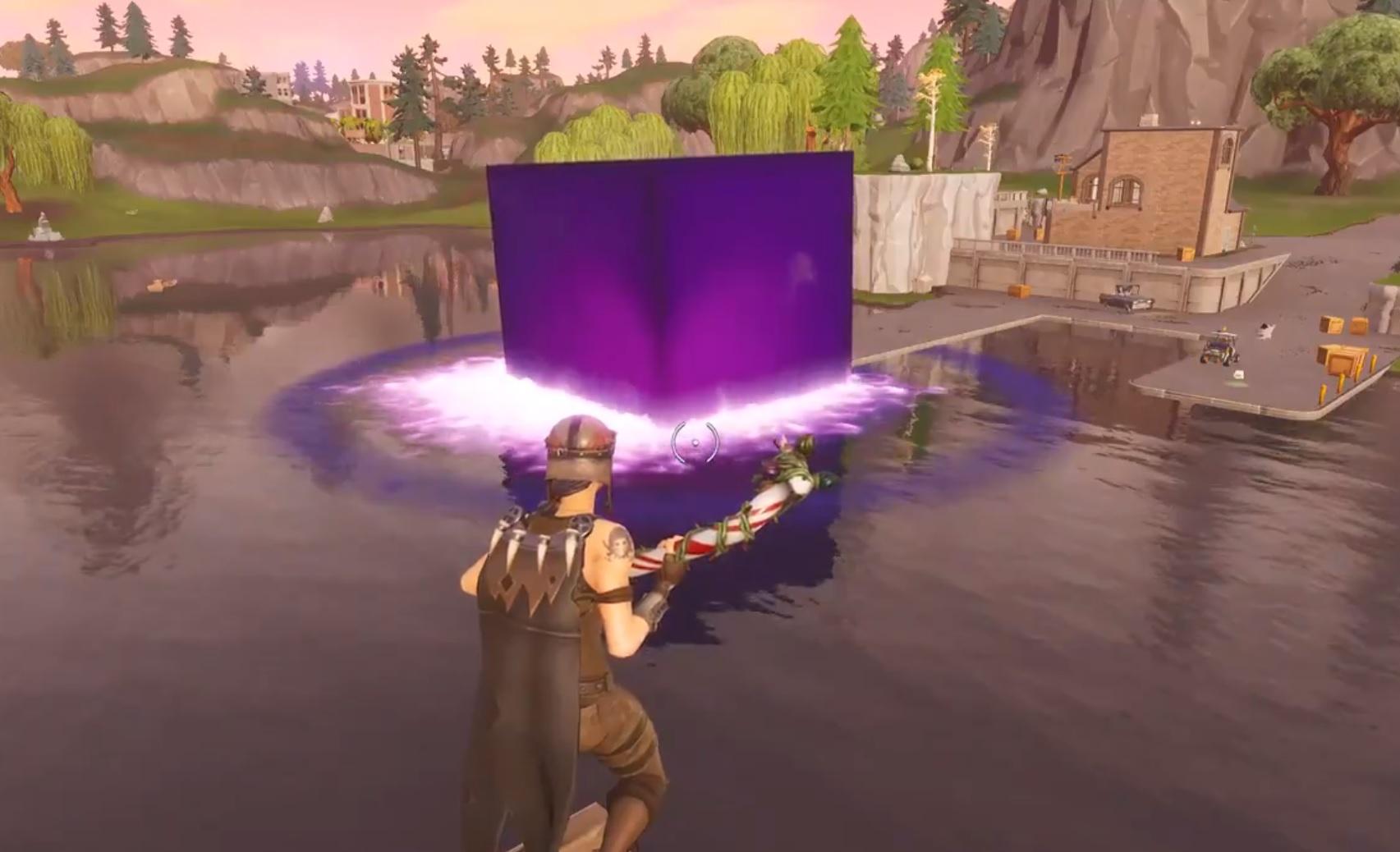 The purple cube rolled into Loot Lake, transforming Fortnite's main water feature into a giant trampoline ahead of Season 6