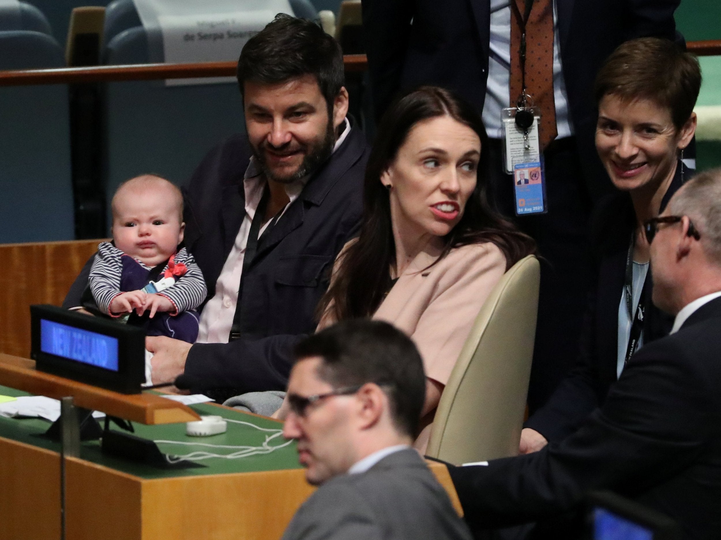 New Zealand Prime Minister Jacinda Ardern sits with her baby Neve at the UN