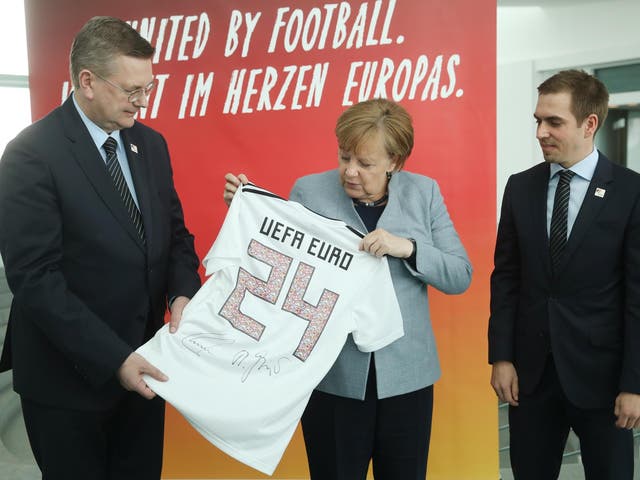 Angela Merkel has thrown her support by Germany's 2024 bid