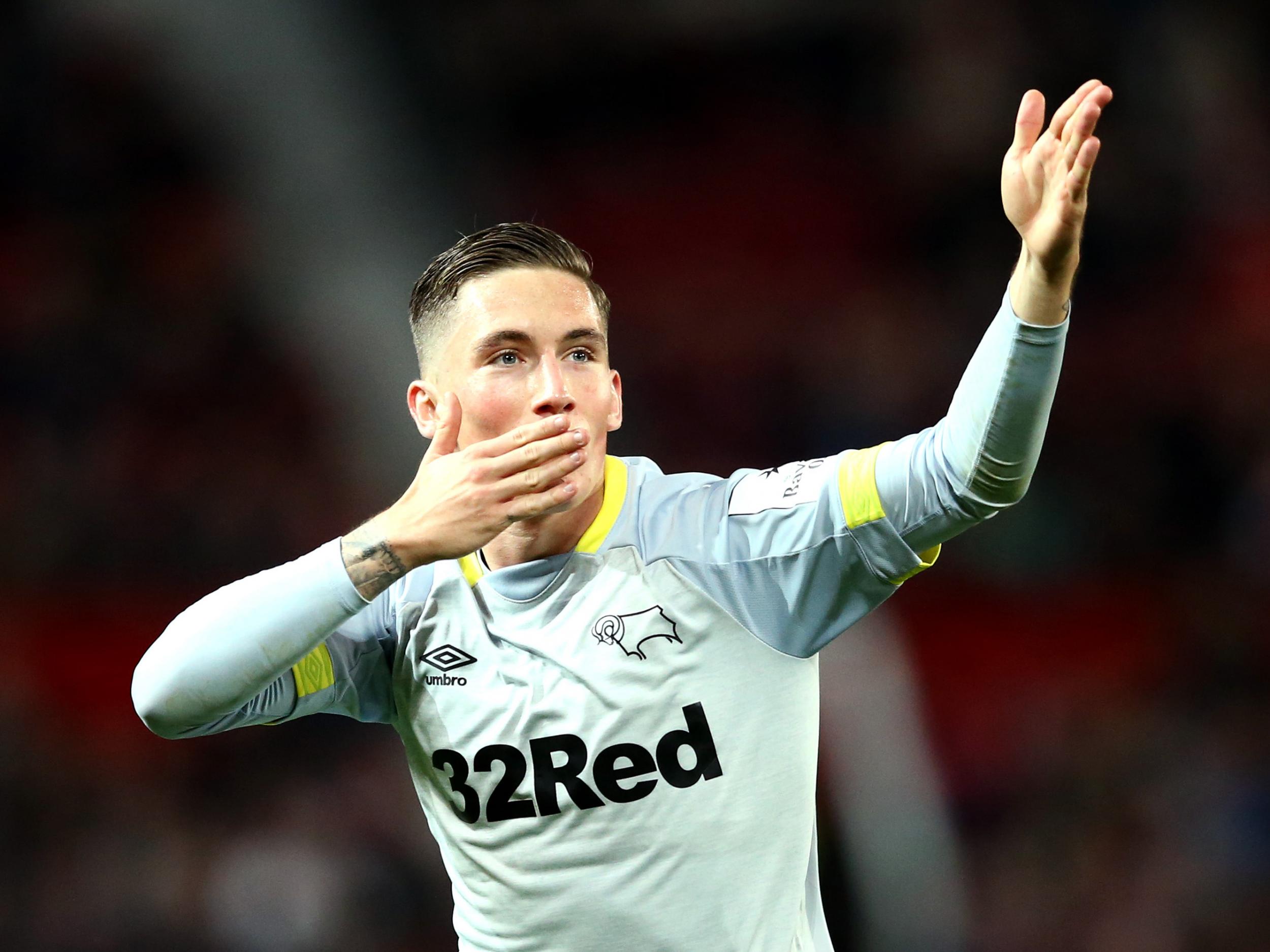 Wilson celebrates his stunning free kick (Getty)