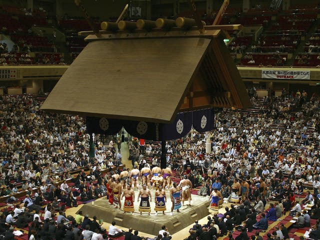 The dohyo is newly constructed before the start of each tournament. The roof of the ring is made to resemble a Shinto shrine showing the clear connection between ancient ritual and the sport of today