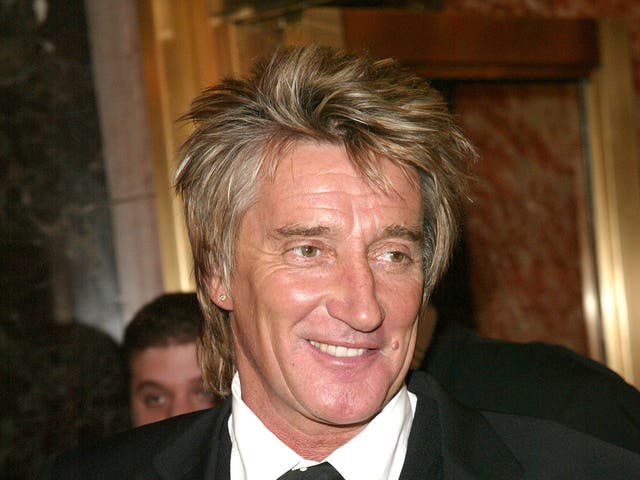 Musician Rod Stewart and his girlfriend Penny Lancaster arrive at "The Boy From Oz" musical opening night performance starring actor Hugh Jackman at the Imperial Theatre October 16, 2003 in New York City.