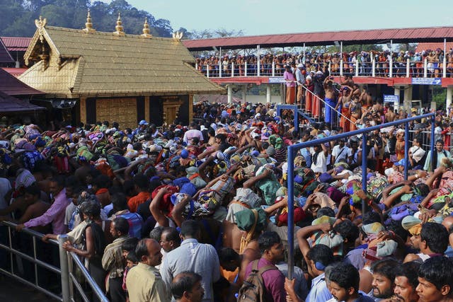 Hindu worshippers queue during a pilgrimage at the Sabarimala temple in the southern Indian state of Kerala