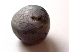 Experts appeal for help deciphering ancient inscription on ‘meteorite’