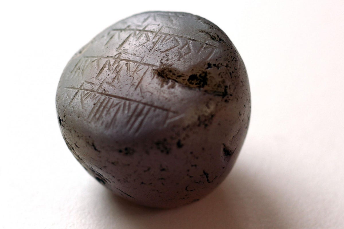 Experts scramble to decipher mysterious inscription on ancient stone ...