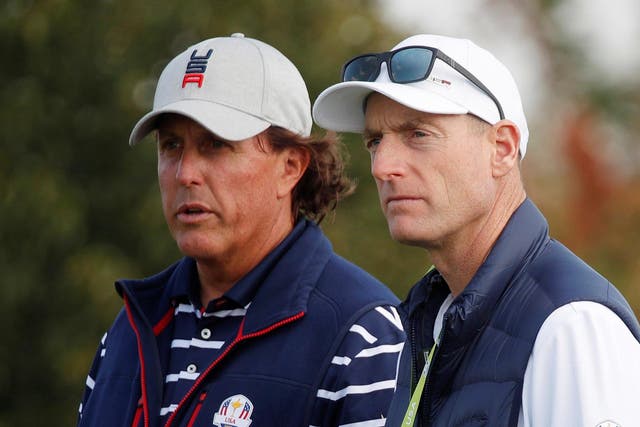 Team USA captain Jim Furyk and Team USA's Phil Mickelson during the Foursomes